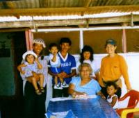 Dona Aura (centre) holds court