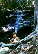 Anaira, age two, by a waterfall